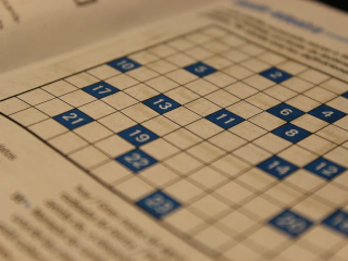 crossword puzzle showing email designation